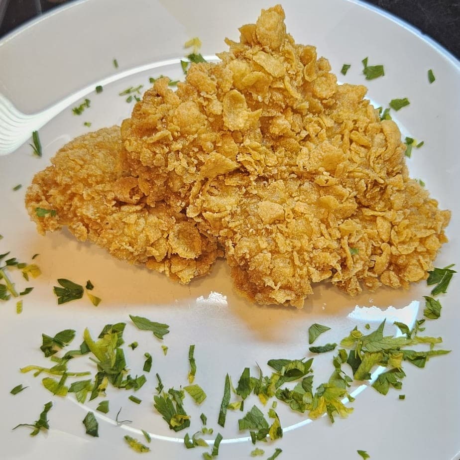 Pulpe de pui in crusta de porumb